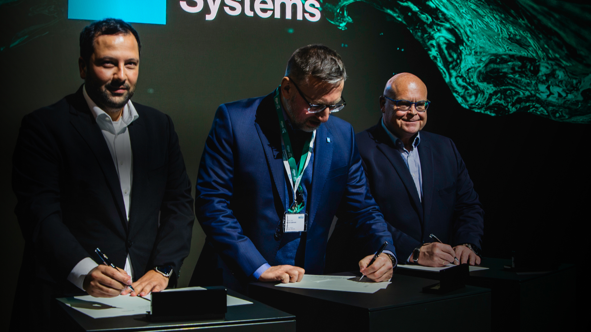 DCX Liquid Cooling Systems and Wilo Group sign cooperation agreement at Wilopark in Dortmund